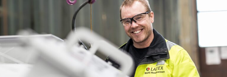 Laitex service engineer smiling.