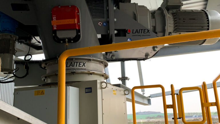 Laitex's gray fuel feeding equipment in use.