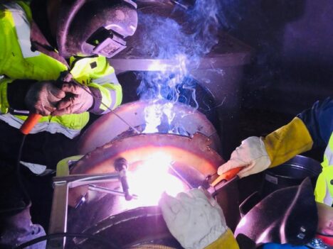 Laitex employee refurbishing material handling equipment.