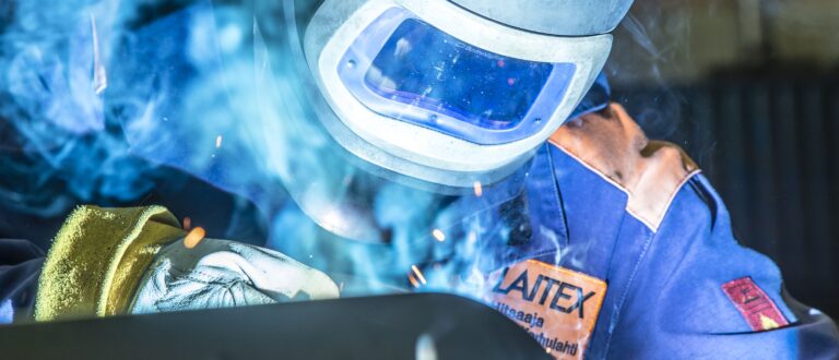 Welder welding a conveyor.