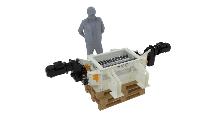 Laitex's product, lump breaker and an engineer standing beside it.