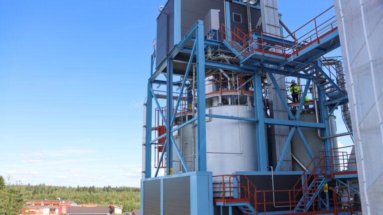 Four silos on top of activated carbon plant roof.