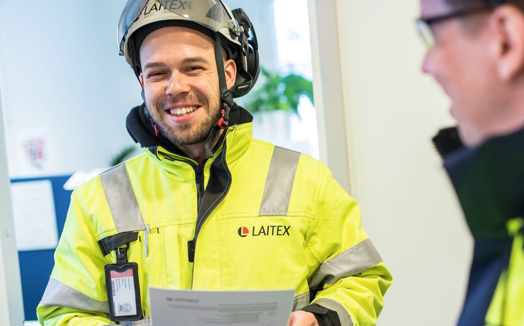 Two man who are Laitex's service department.