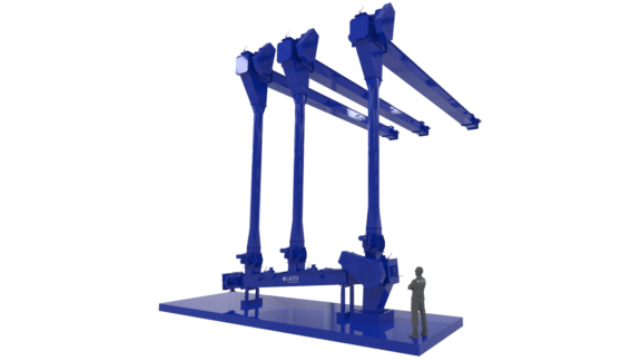 Recovery boiler conveyors in blue and an engineer standing beside them.