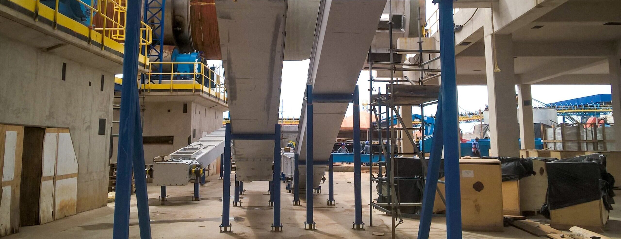 Two grey lime conveyors.