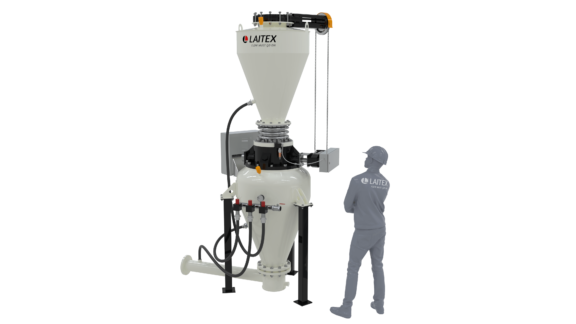 Man standing next to white pneumatic conveyor system.